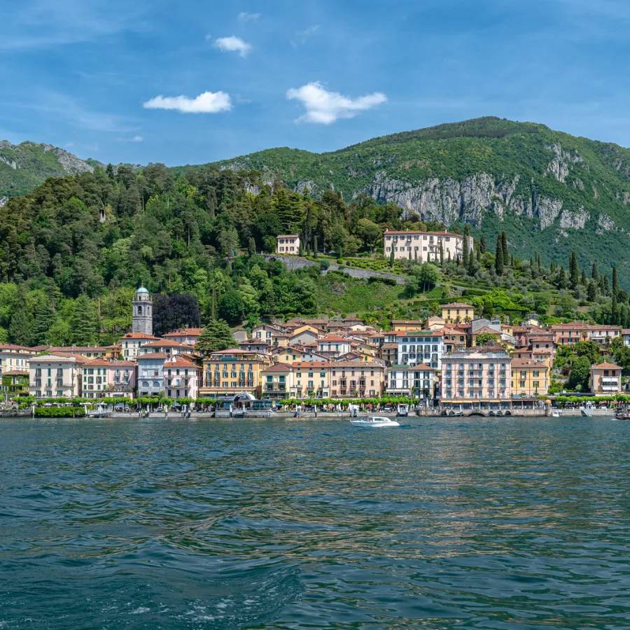 Panoramic view of Bellagio from Lake Como with colorful buildings and lush green hills