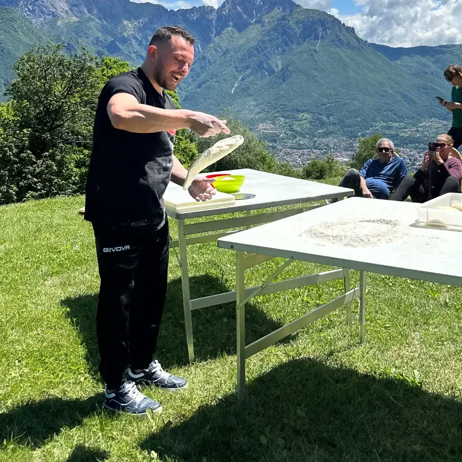 Chef-performing-acrobatic-pizza-show-at-Baita-TreeB-Bellagio
